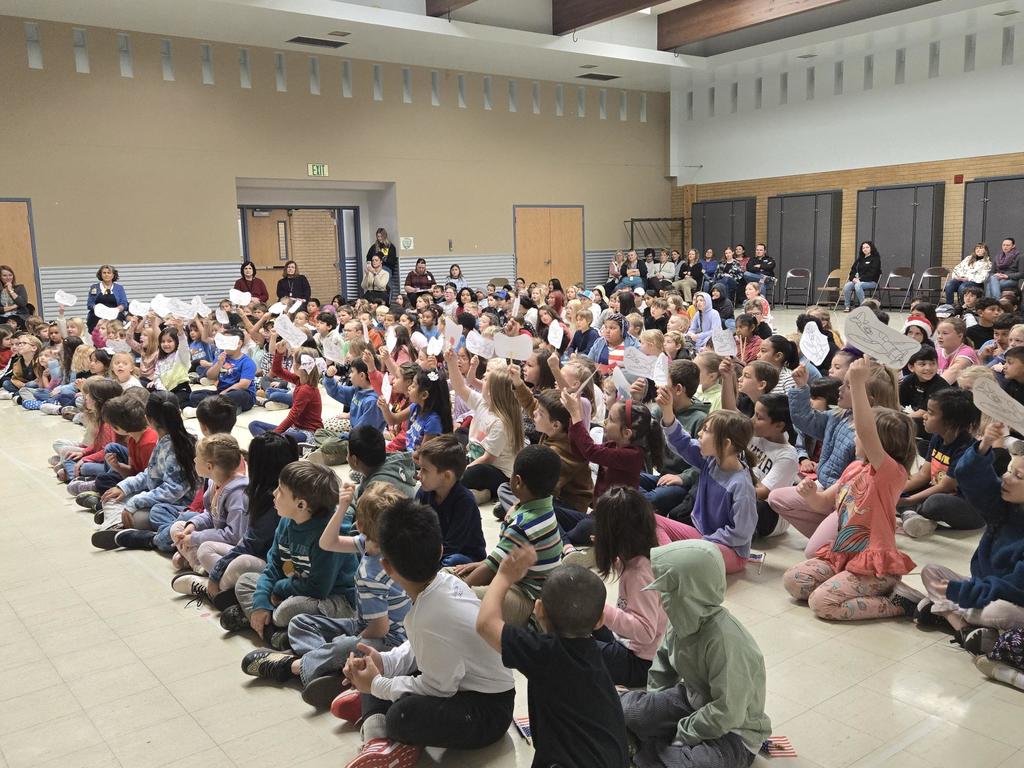 1st graders sing during a school assembly to our veterans!