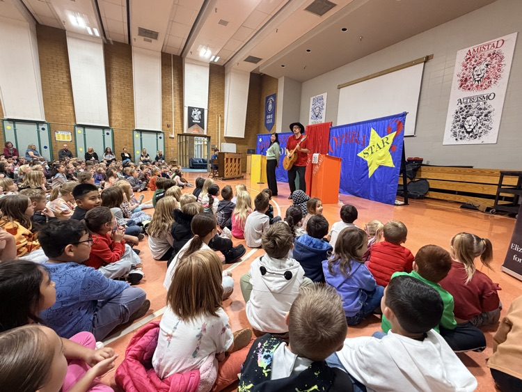 students at an assembly