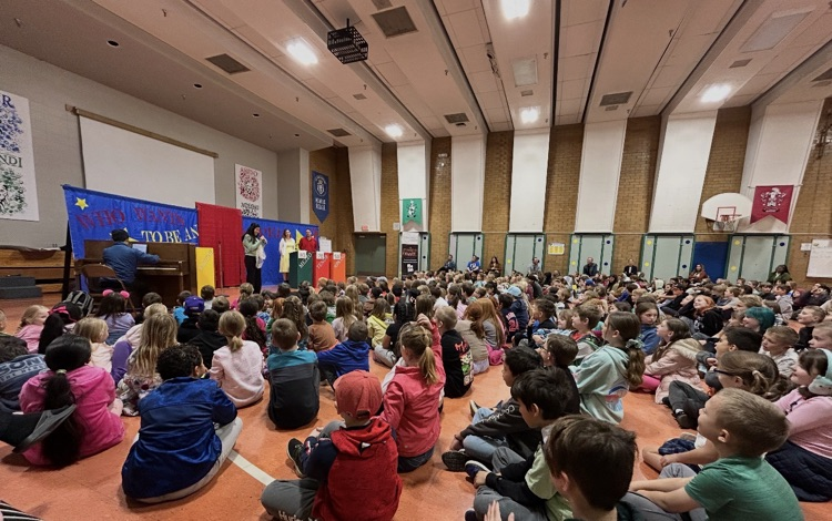 students at an assembly