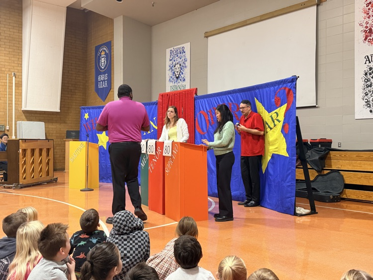 people performing for the assembly