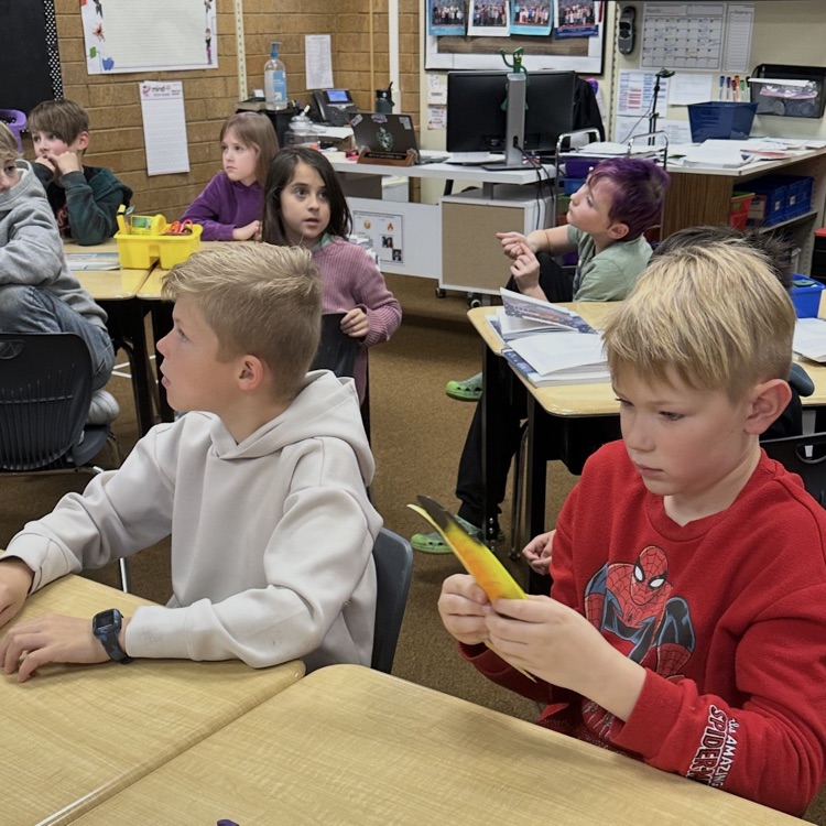 students looking at a beak