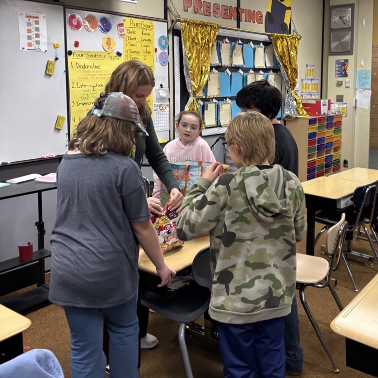 students putting prizes together for the cart