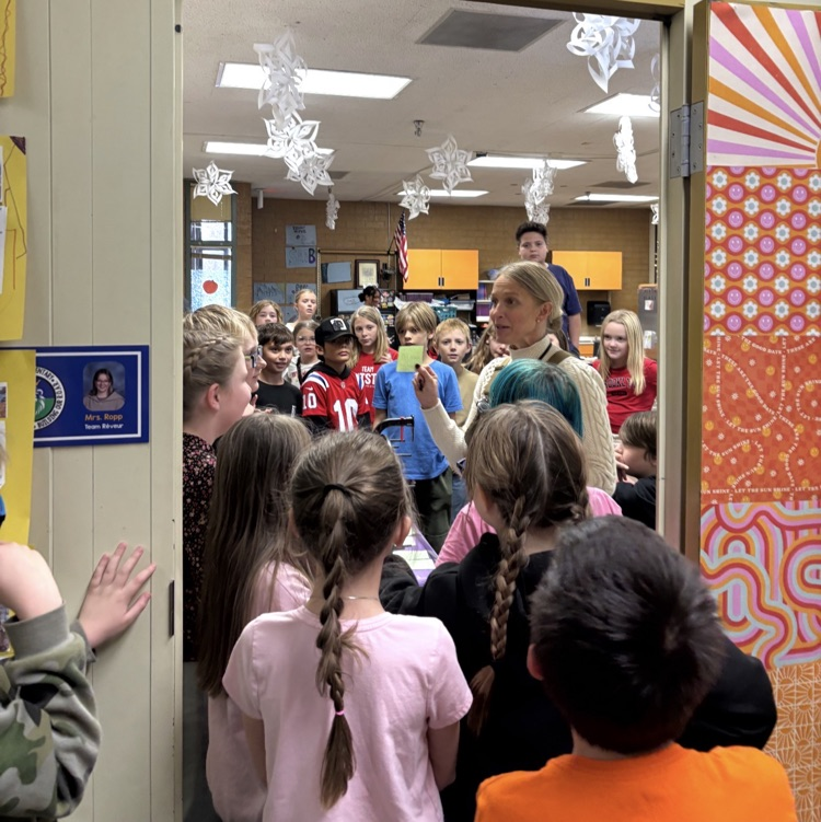 students taking the prize cart around to teachers