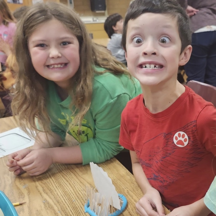 2nd graders posing with their turkey trap engineering process