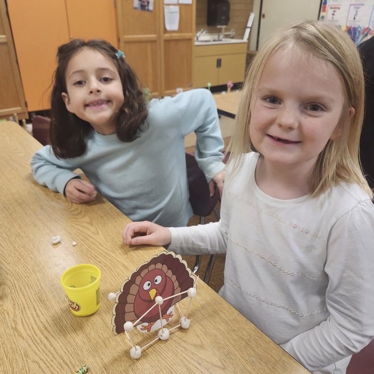 2nd graders posing with their turkey trap engineering process