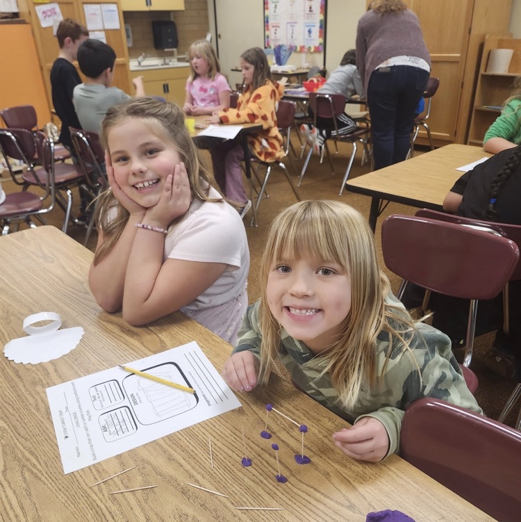 2nd graders posing with their turkey trap engineering process