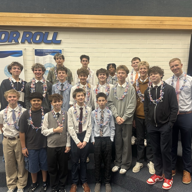 our boys basketball team smiling in group photo