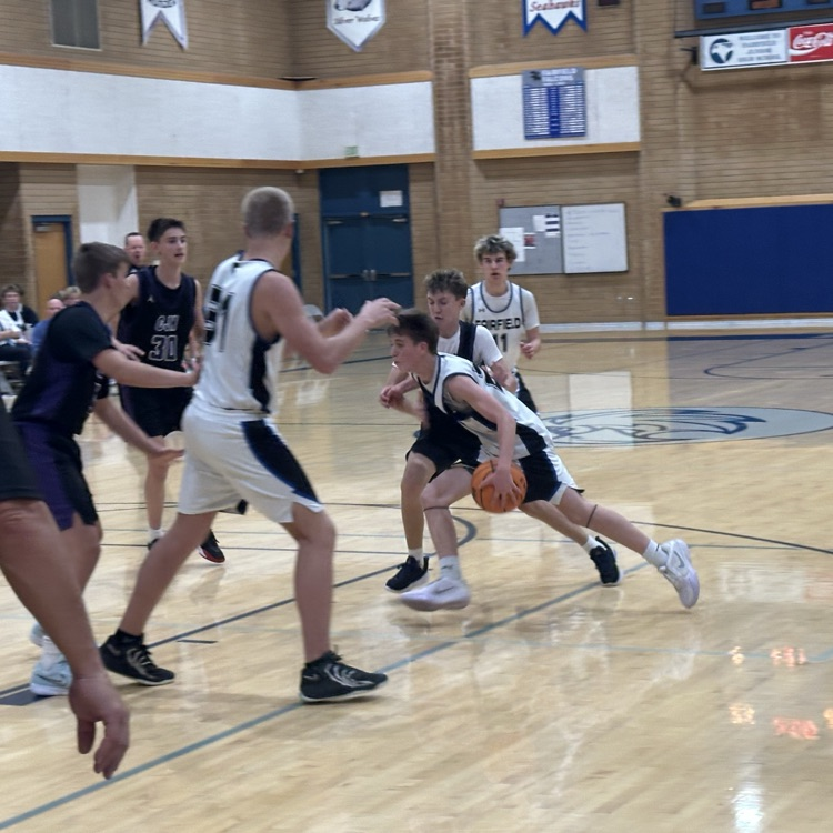 FFJH basketball player dribbling ball