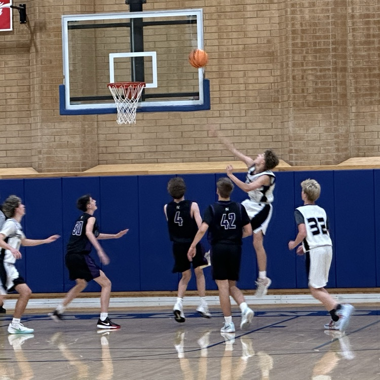 FFJH basketball player dribbling ball