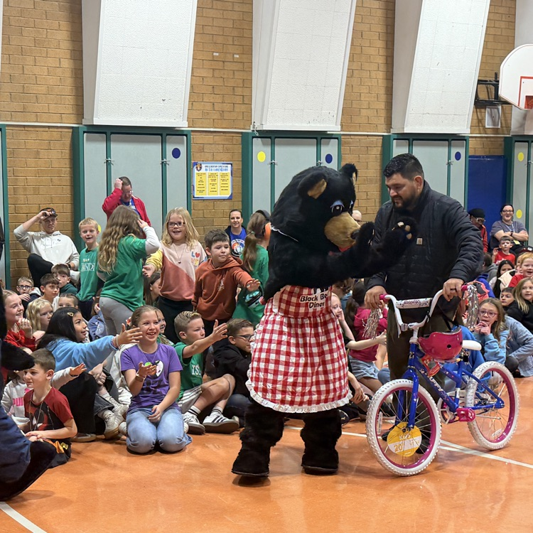 Black Bear Diner ‘bears’ walking in with bike for the student who won the perfect attendance contest in 1st term