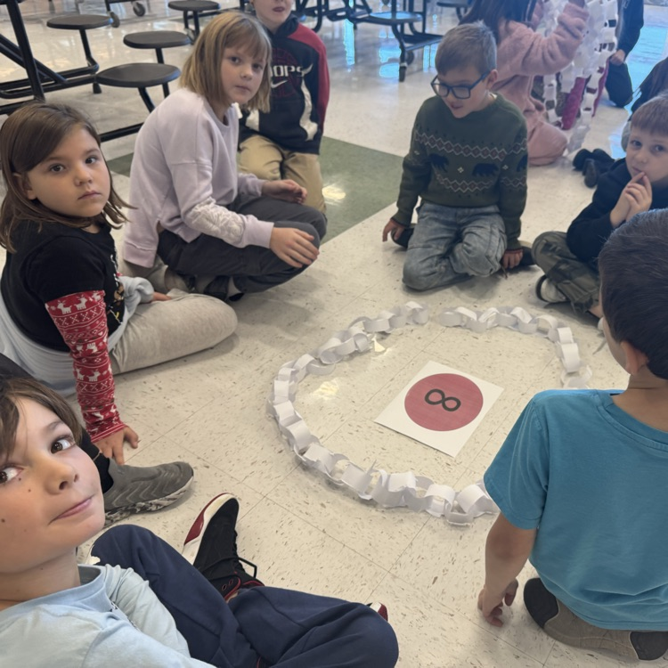 students with their paper chain