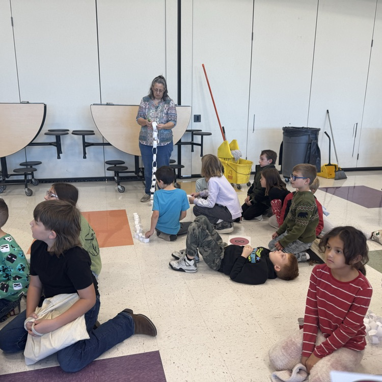 Students doing chain activity in the gym