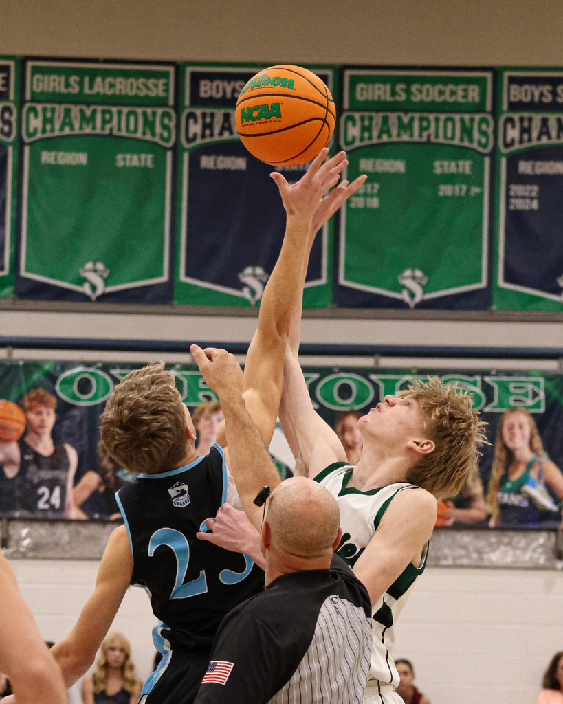 Shoreline and Farmington Junior High's tip off at the Davis School District Boys Basketball Championship Game. 
