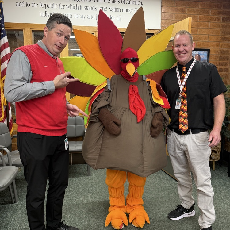 Columbia administration with person in a turkey costume