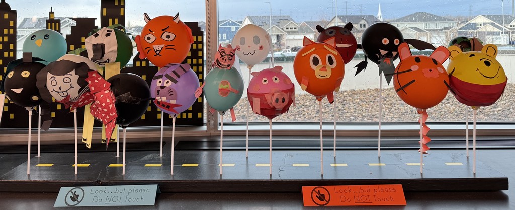 balloons decorated like floats for the Macy's Thanksgiving Parade