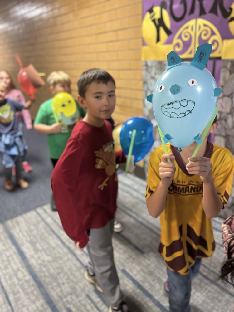 Students with balloon floats.