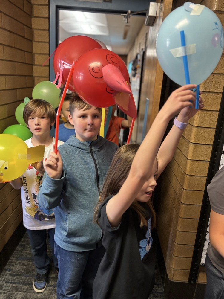 Students with balloon floats.
