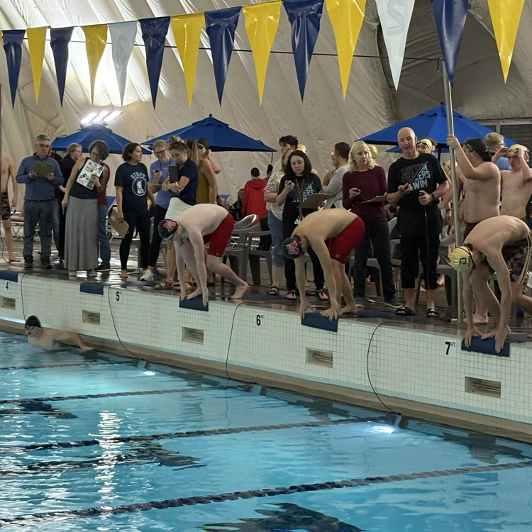 student swimming in the pool