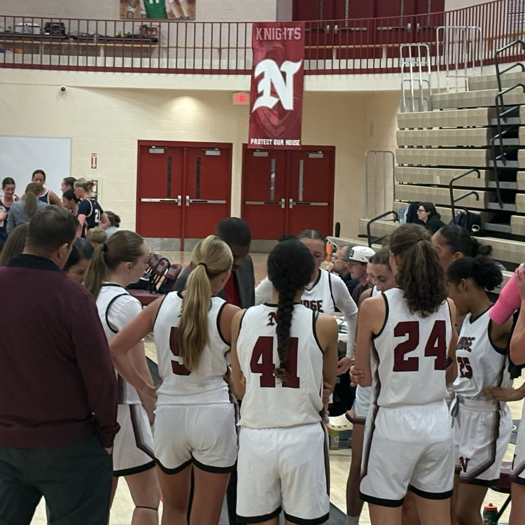 Coach Smith and the girls basketball team