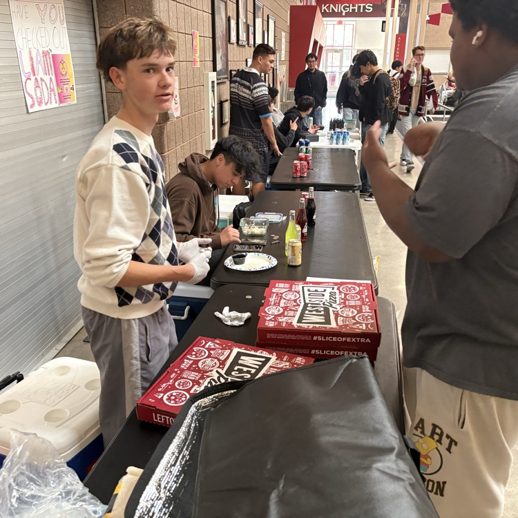 Students selling for the business fair.