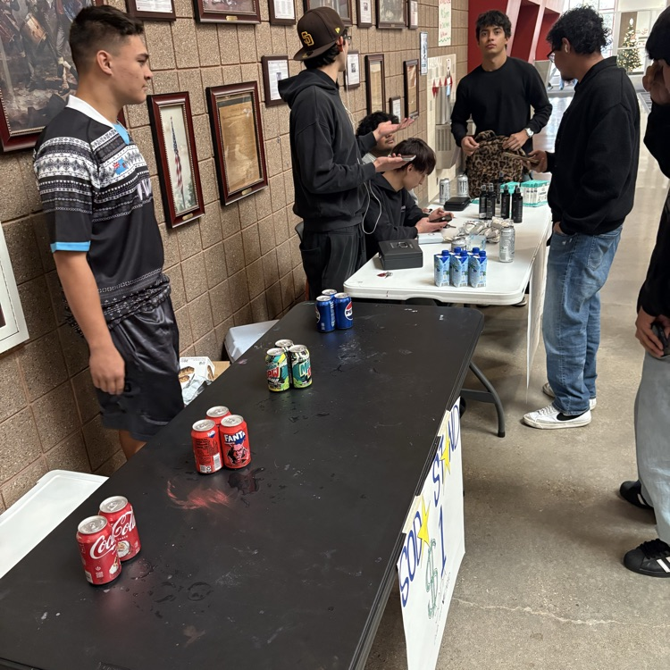 Students selling for the business fair.