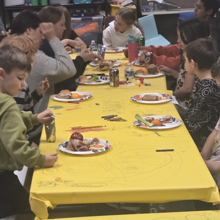students eating and talking with friends