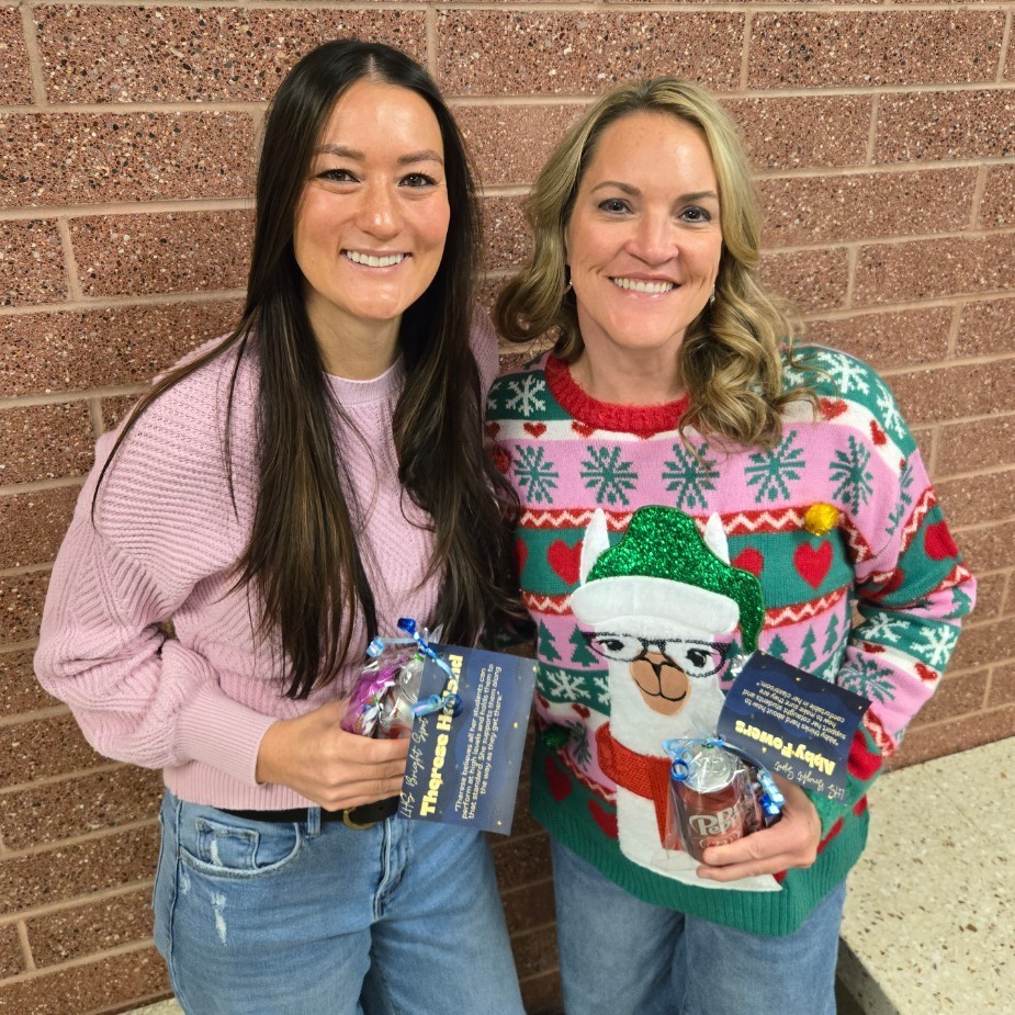 Mrs. Holland and Mrs. Fowers holding their teacher Bright spots awards