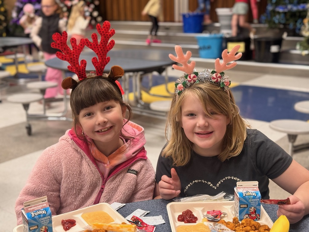 Students with holiday antler headbands