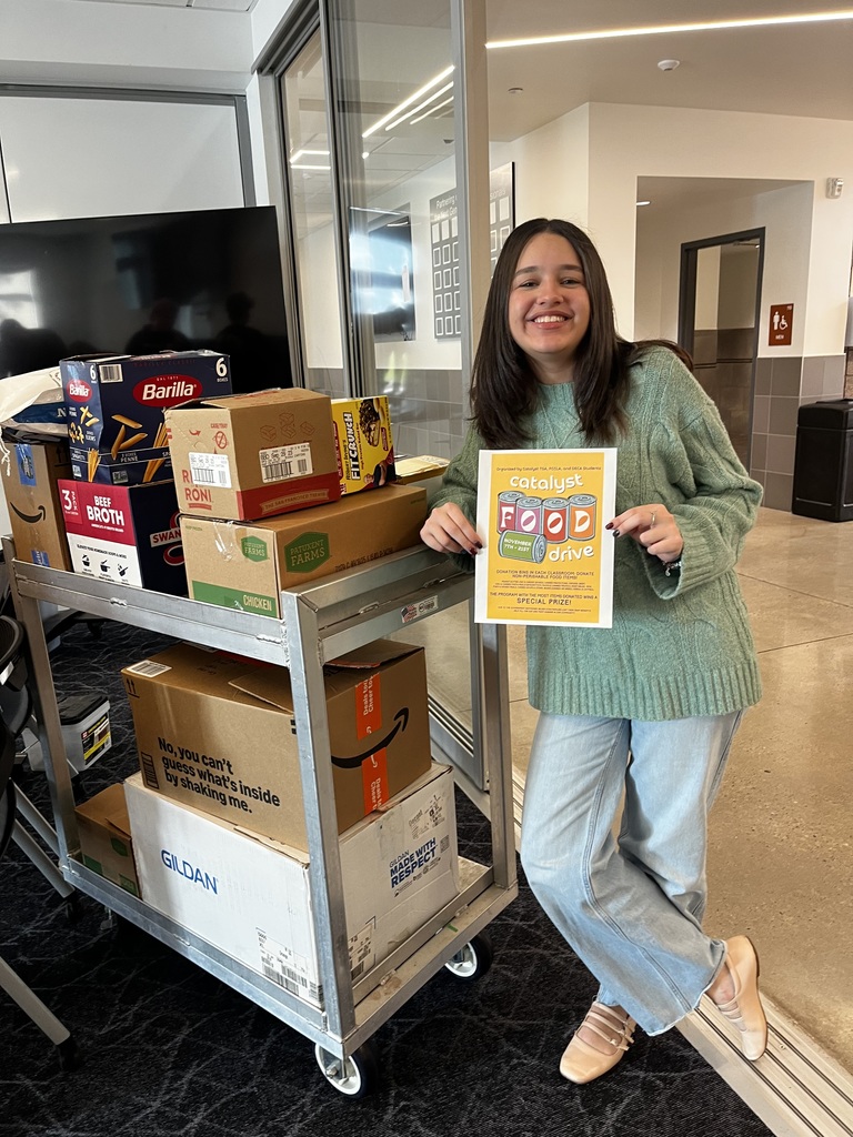 student leader rolling out sorted food