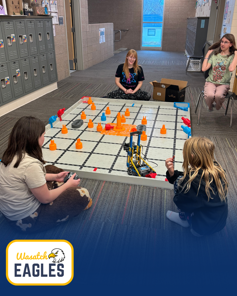 Robotics team practicing with Vex robots