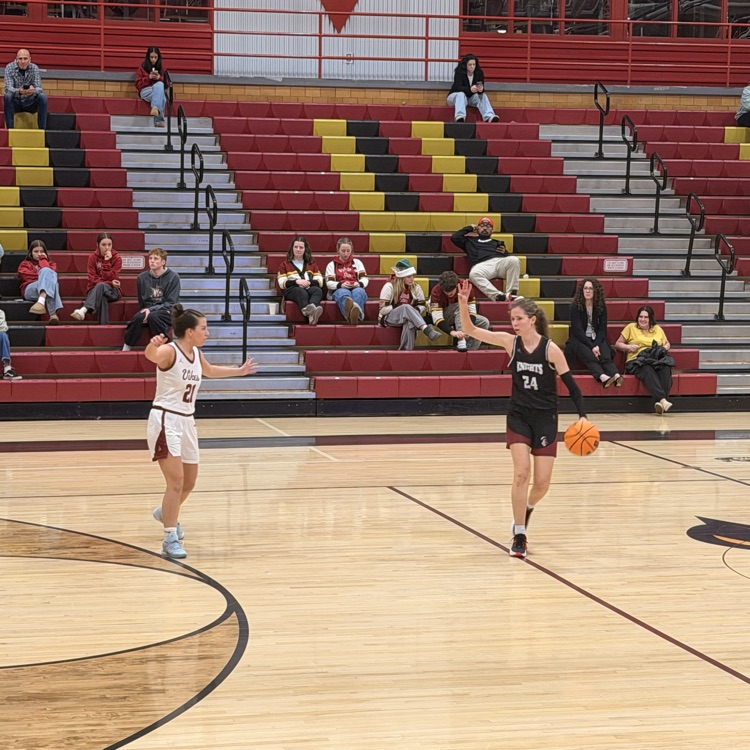 Northridge brings the ball down the court.