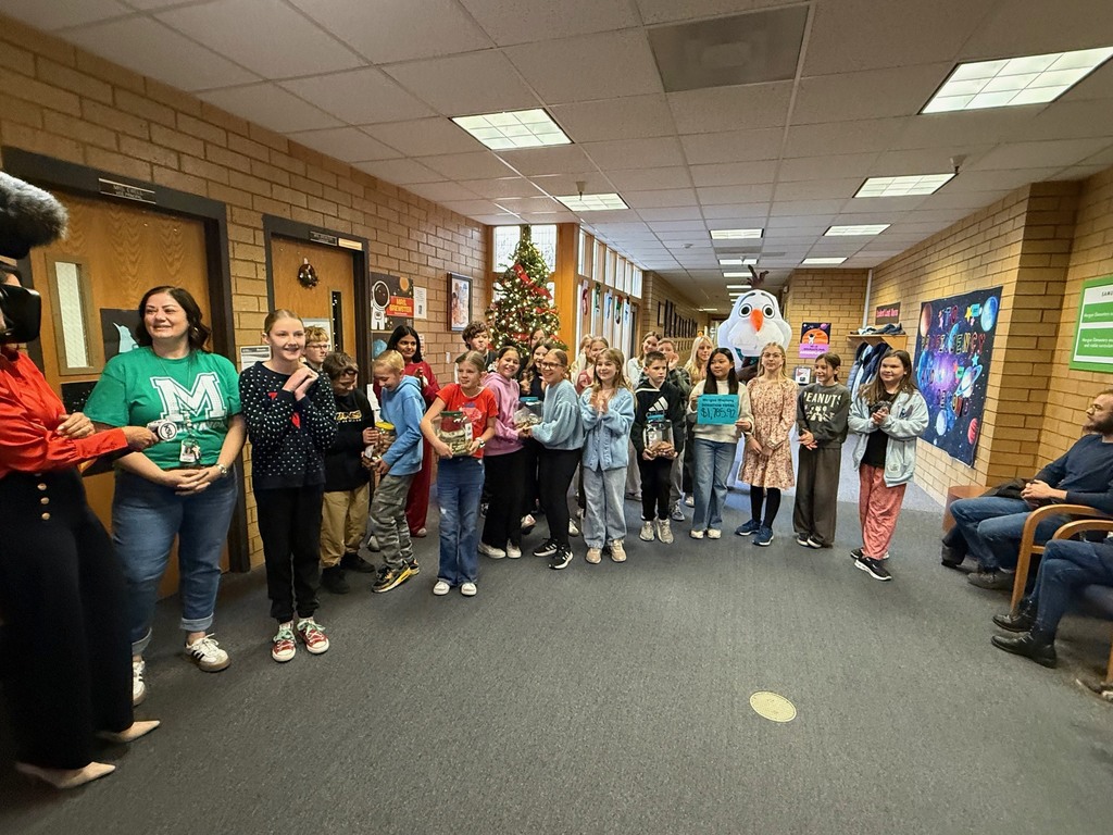 Student Council and Jr. Hope Squad students from Morgan Elementary with KSL's reporters and Olaf as we present them with our donation total.