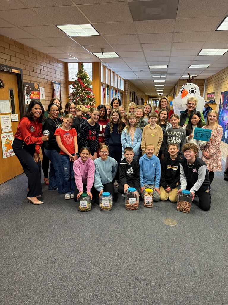 Student Council and Jr. Hope Squad students from Morgan Elementary with KSL's reporters and Olaf as we present them with our donation total.
