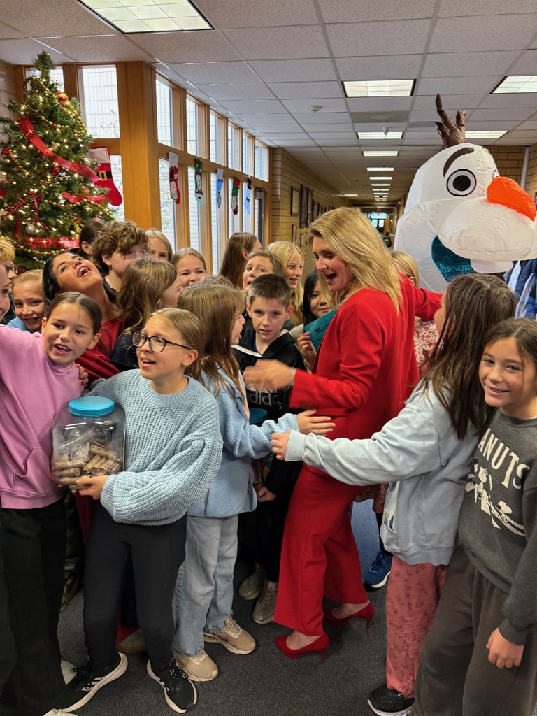 Student Council and Jr. Hope Squad students from Morgan Elementary with KSL's reporters and Olaf as we present them with our donation total.