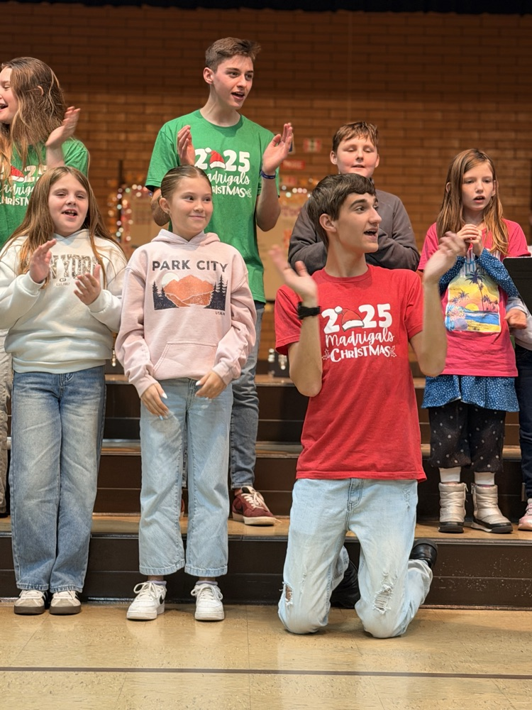 Madrigals singing for students in assembly!