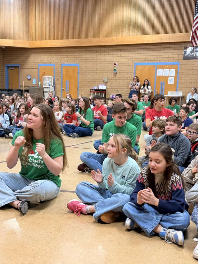 Madrigals singing for students in assembly!