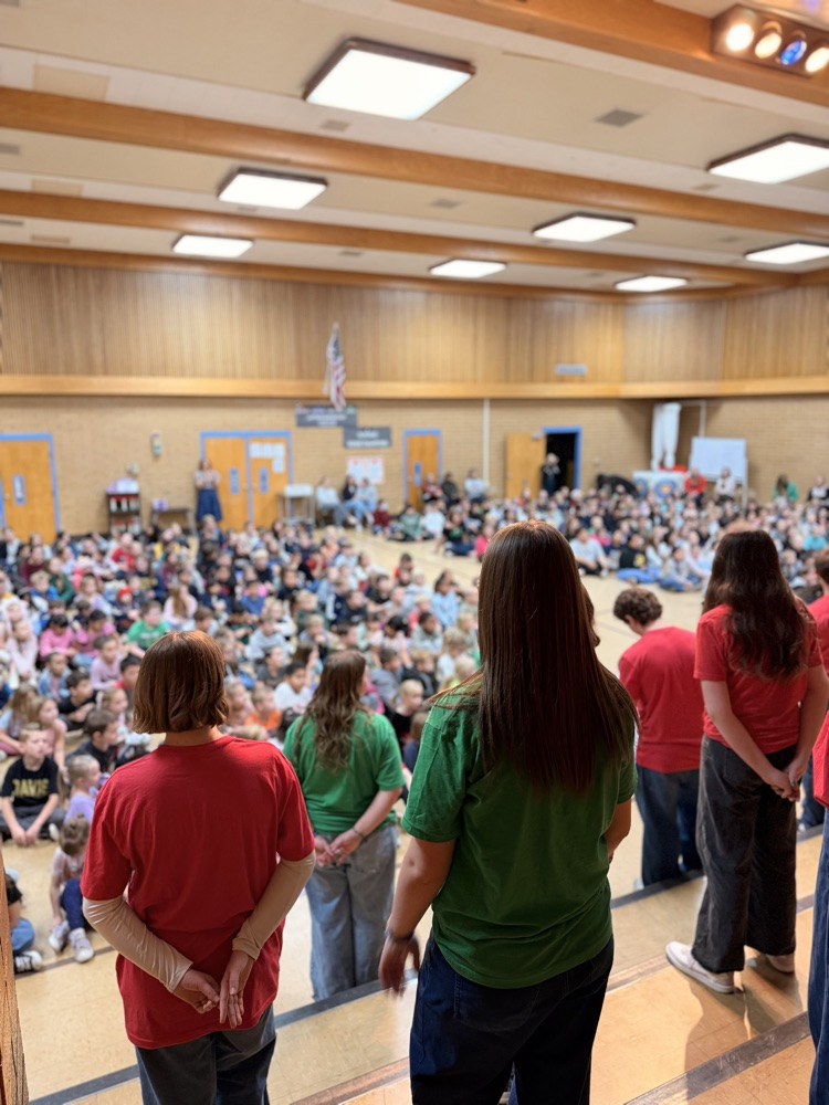 Madrigals singing for students in assembly!