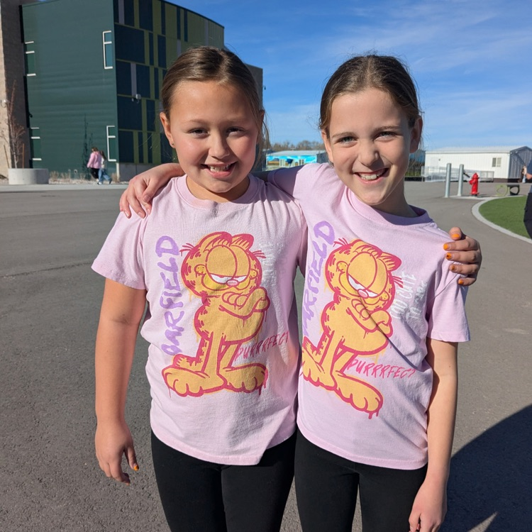 two students with garfield t-shirts