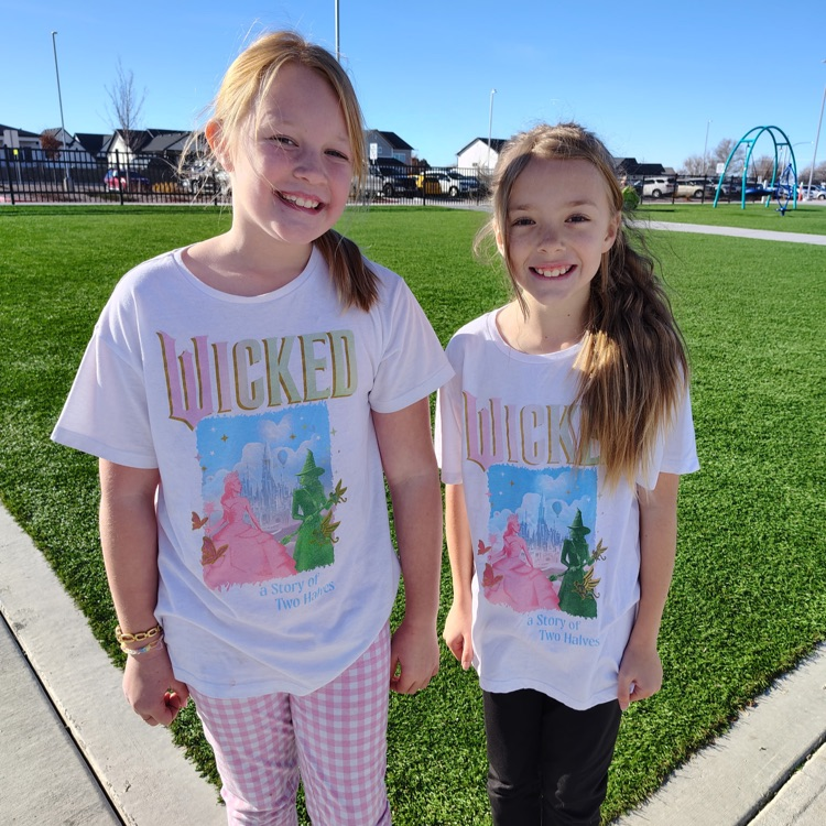 two students with wicked t-shirts