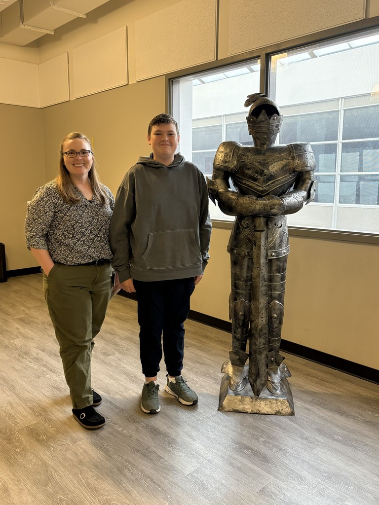 images of students standing next to teachers and a knight statue