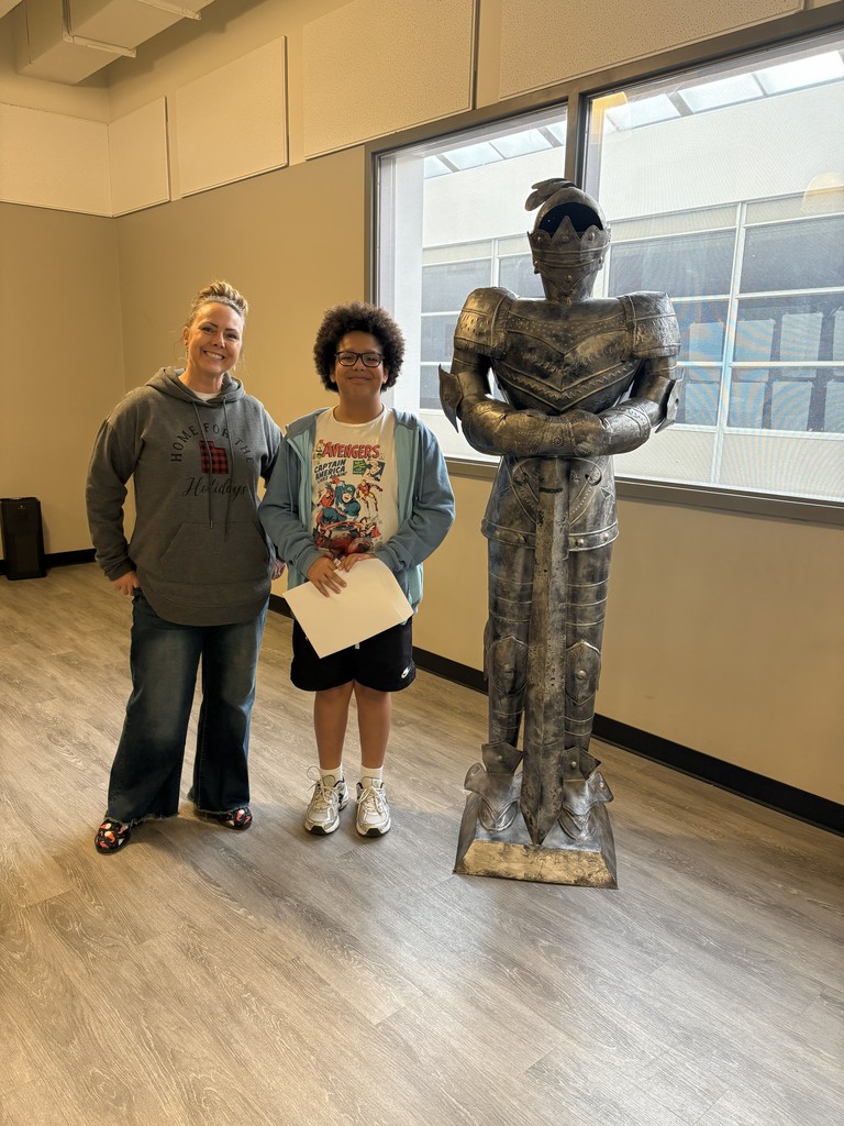 images of students standing next to teachers and a knight statue