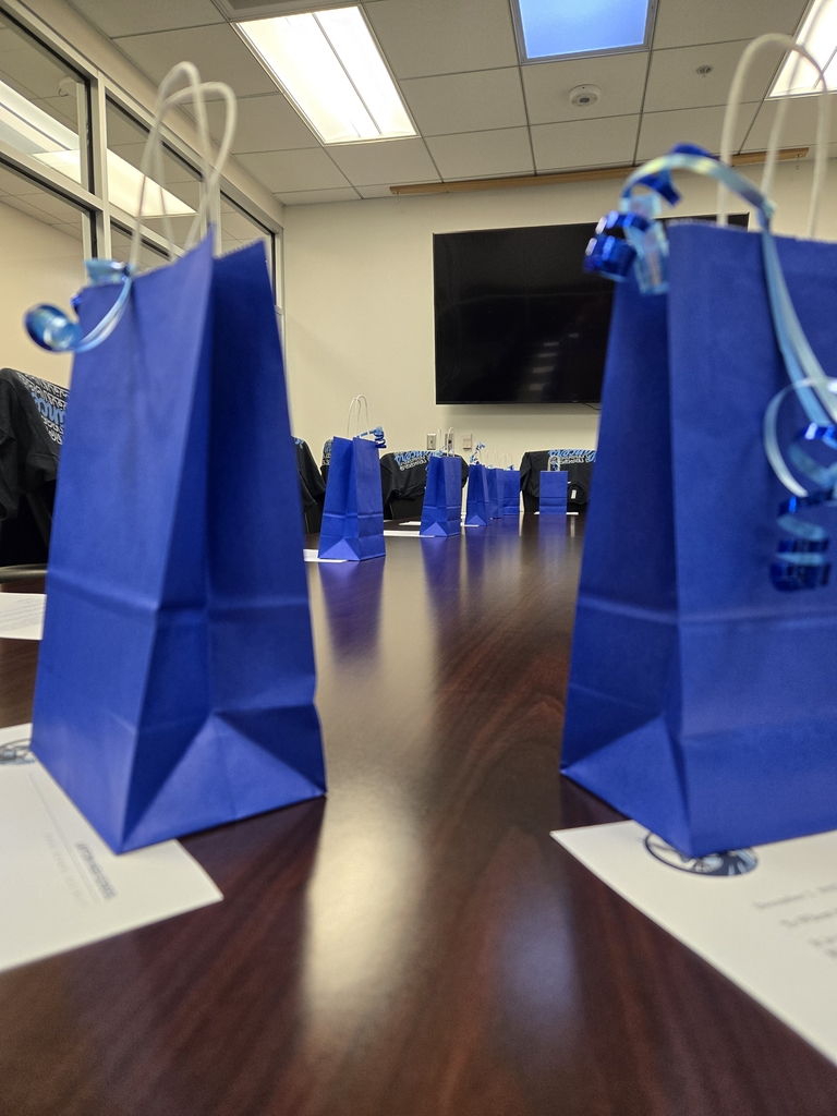 student of the month award letters and bags waiting to be passed out