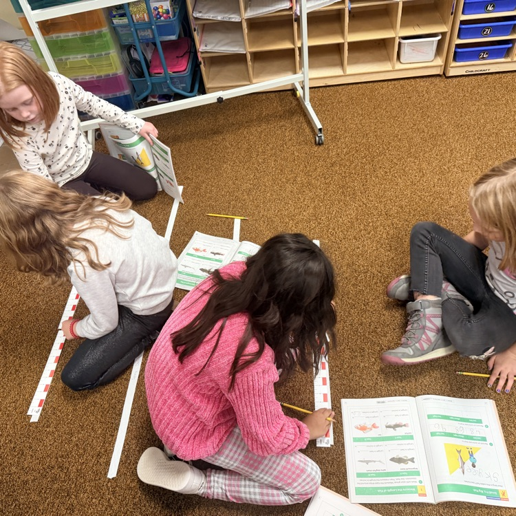 2nd graders learning about measurement 
