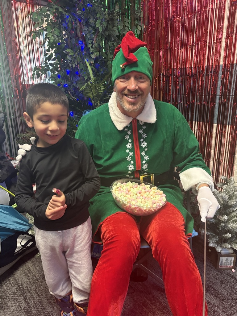 Mr. Nash dressed up as Pinkie with one of our kindergartners