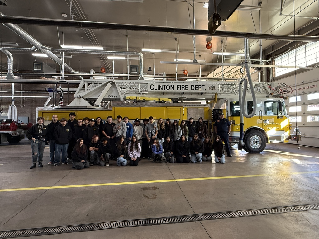Latinos in Action students in front of the firetruck at the  Clinton Fire Station 