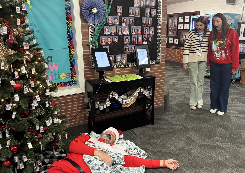 Teachers looking at Clifford