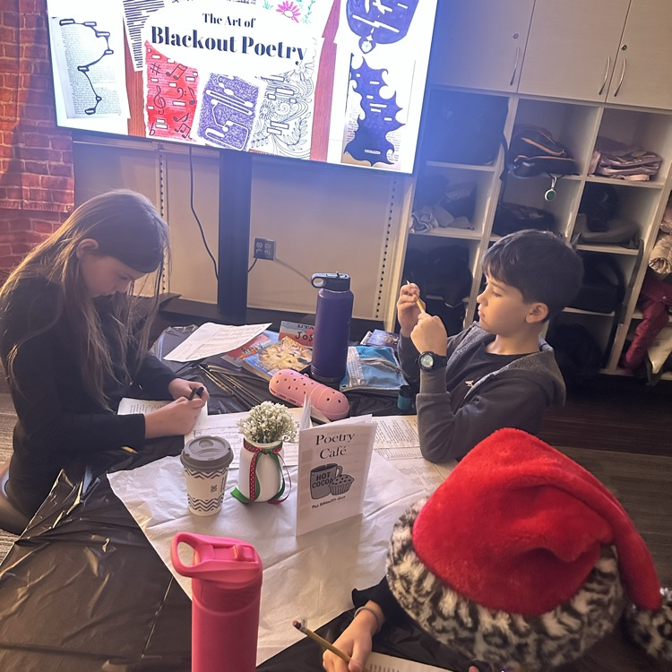 students marking up a book page for blackout poetry art