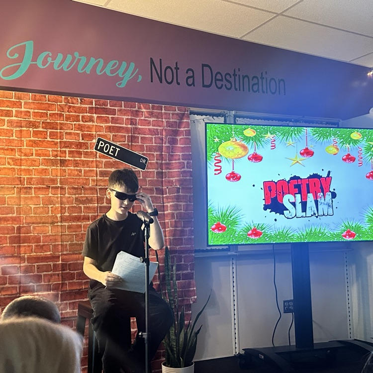 boy presenting poetry sunglasses  for poetry sla