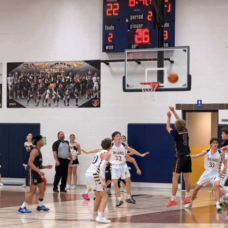 number five shoots the ball