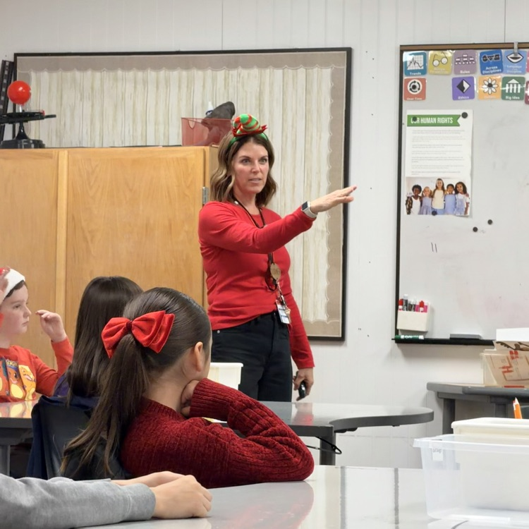Students in STEM creating light up cards!